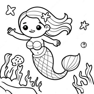 Seikkailunhaluinen Musta Merenneito Tutkimassa Koralliriuttoja Varityskuva 120607-55321